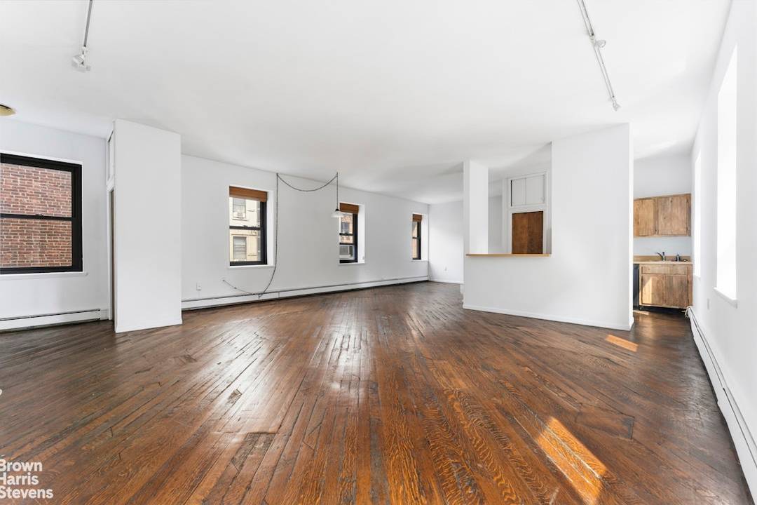 This is a sunny, loft like one bedroom apartment at the renowned cooperative complex The Piano Factory, located in the Theater District Clinton area of Manhattan.