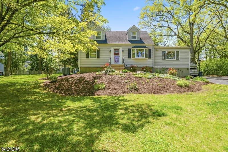 WOW ! Beautiful, Updated 4 Bedroom Cape in a great location within the Indian Lake Community.