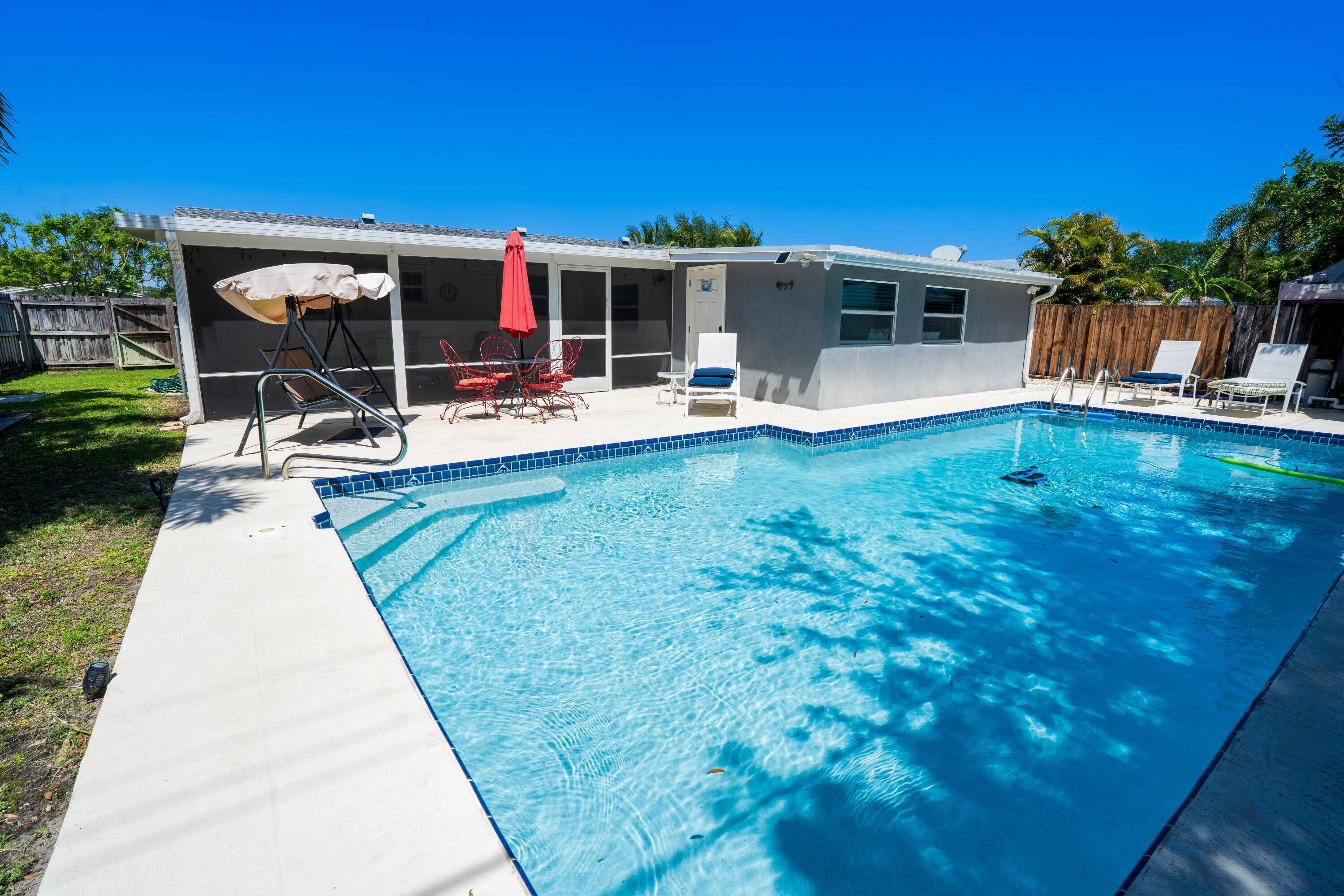 Absolutely stunning well kept 4 bedroom 2 bath room home located in the heart of Palm Beach Gardens.