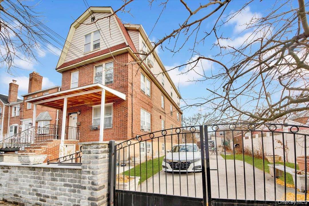 One of the very few existing Brick detached over 4200 sq feet legal three family with a full finished walkout basement situated on 50x100 flat lot.