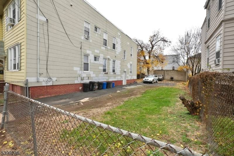 Located in the Weequahic Section of Newark, this well situated four family property sits on a 72x100 lot in a C1 Commercial Zone, offering strong rental potential with separate utilities ...