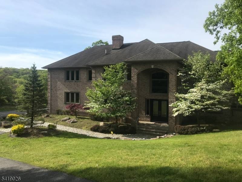 Stunning from the curb remarkable within, this 5 Bed 4.