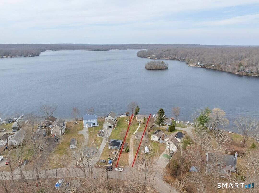 Rare Lakefront Sanctuary with Panoramic Views.
