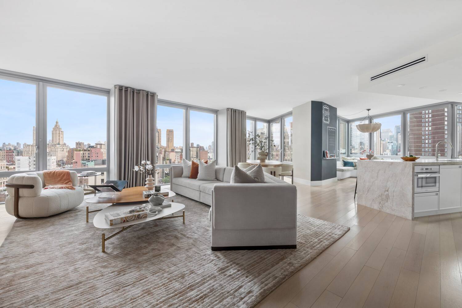 This magnificent, 2, 834 square foot, four bedroom, four and a half bathroom home unveilssweeping Upper West Side views from Central Park to Columbus Circle through south, east, and west ...