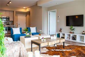 Escape to better at Harbor Point s newest luxury, waterfront residential building.