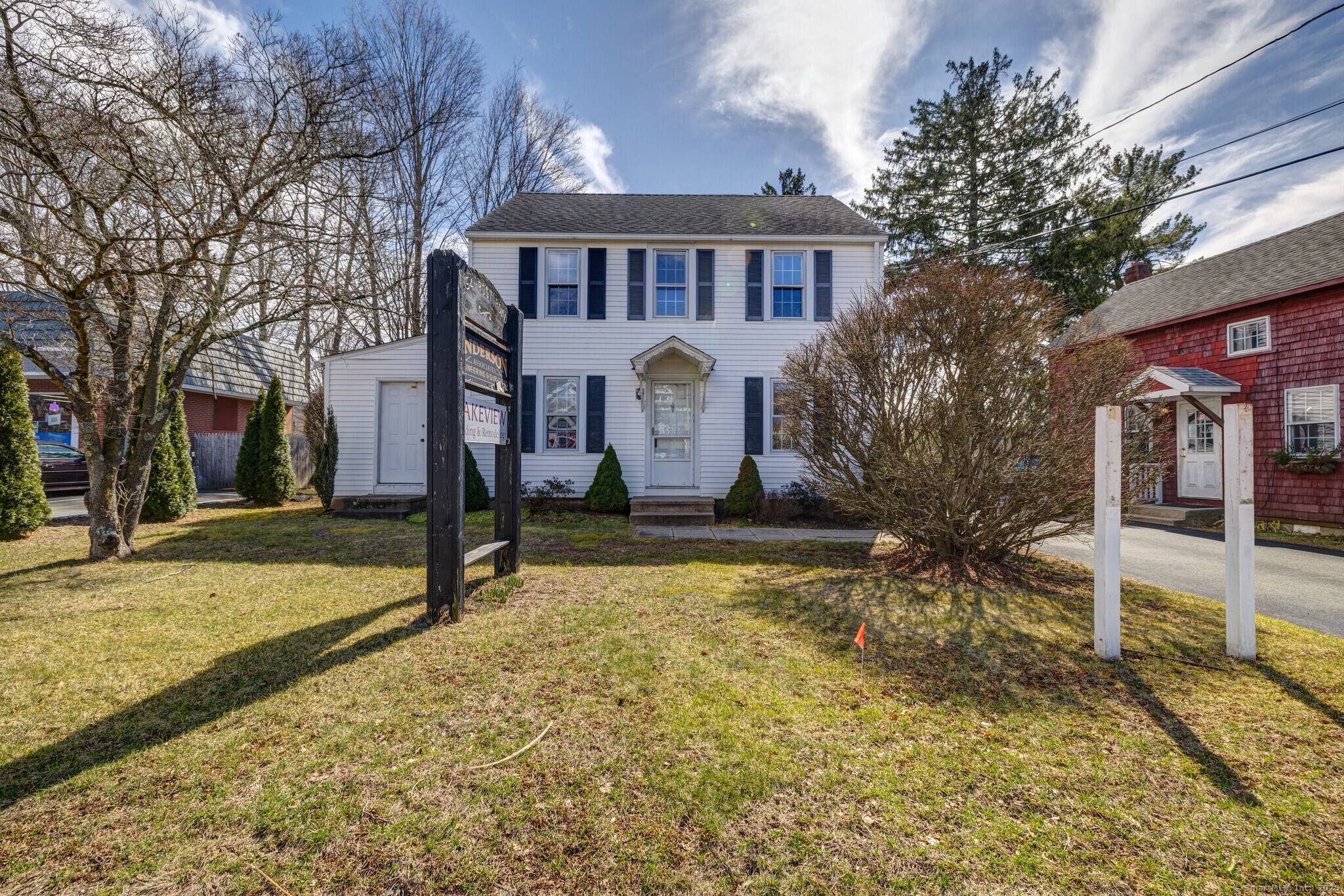 RARE OPPORTUNITY TO OWN TWO BUILDINGS IN GUILFORD Unlock the potential of this prime commercial property on the bustling Boston Post Road, just one block from Guilford's historic town Green.
