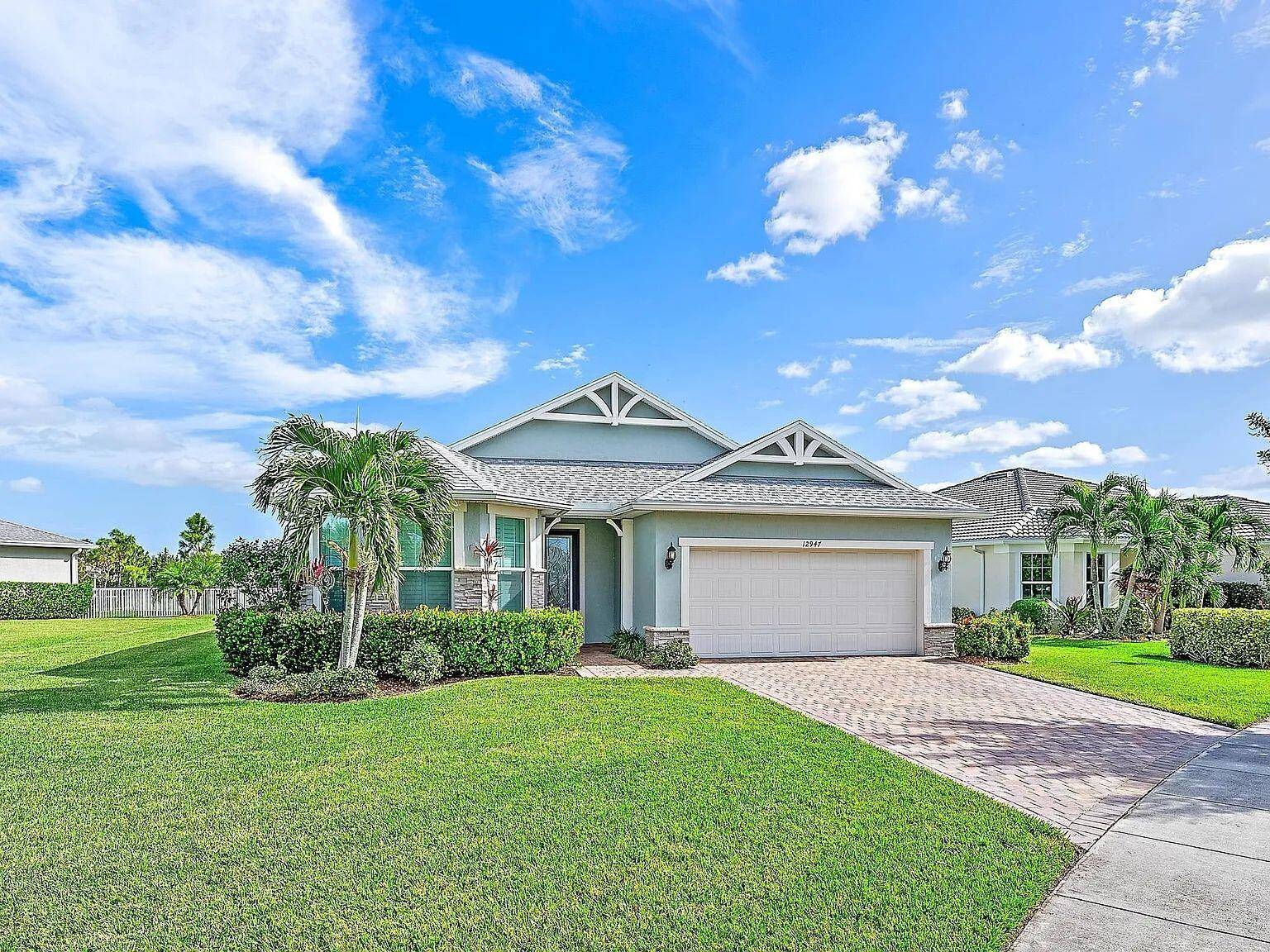 Beautiful CBS 3 bedroom 2 bath waterfront property on oversized corner lot, in gorgeous 55 gated community in Tradition of Port St Lucie.