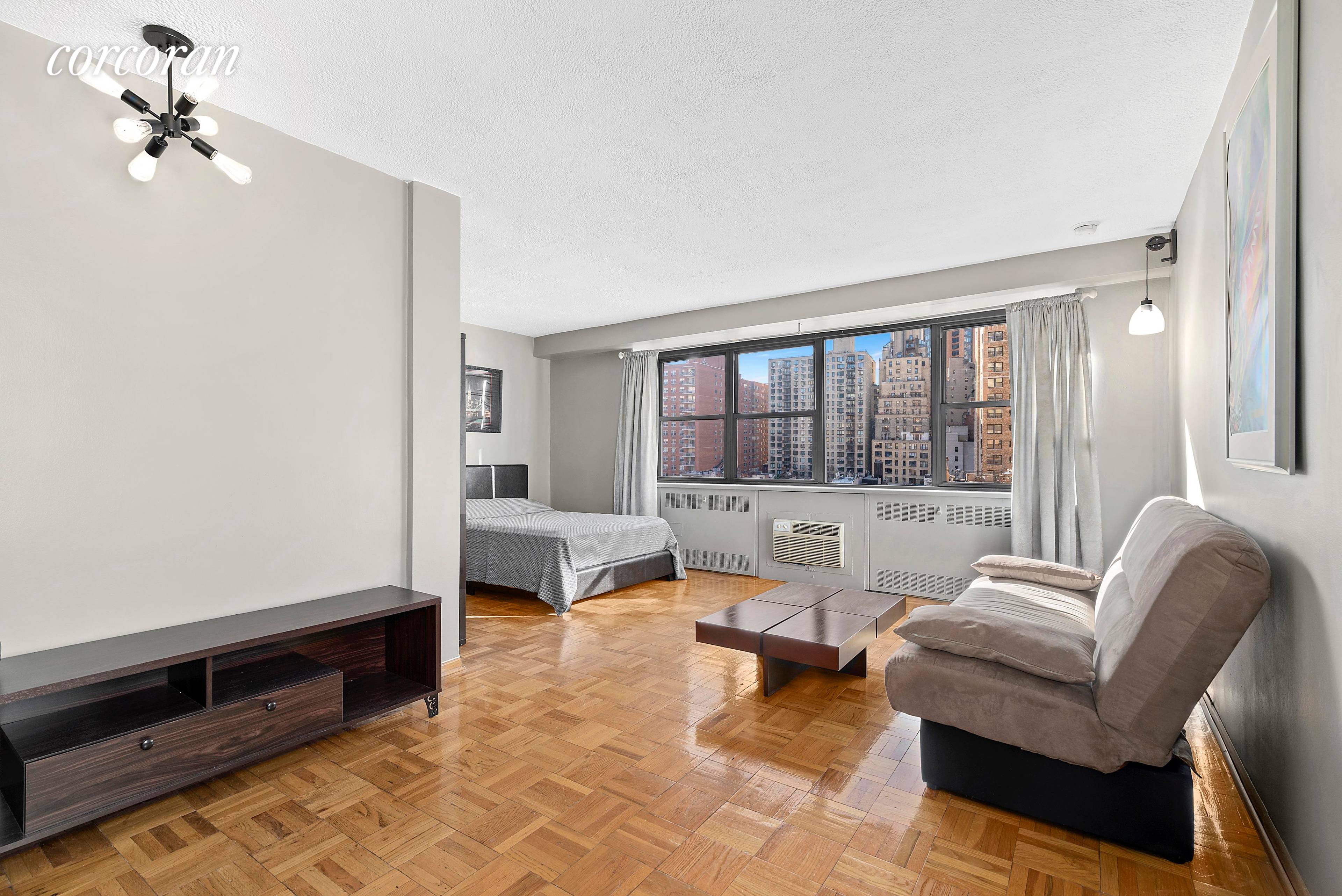 Beautiful, bright south and west facing alcove studio just off of Park Avenue !