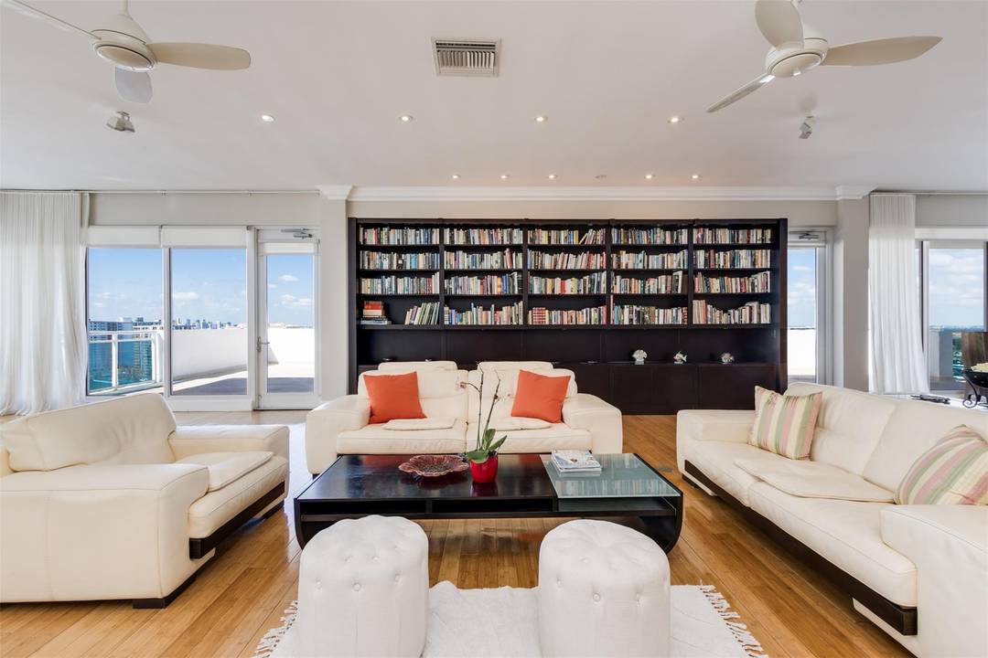 VIEW THE WORLD FROM HIGH IN THIS LUXURIOUS, ONE OF A KIND, OPEN FLOOR PLAN PENTHOUSE ON THE BEACH, 12 FT CEILINGS, GORGEOUS BAMBOO WOOD FLOORS, BRIGHT AND REMODELED THIS ...