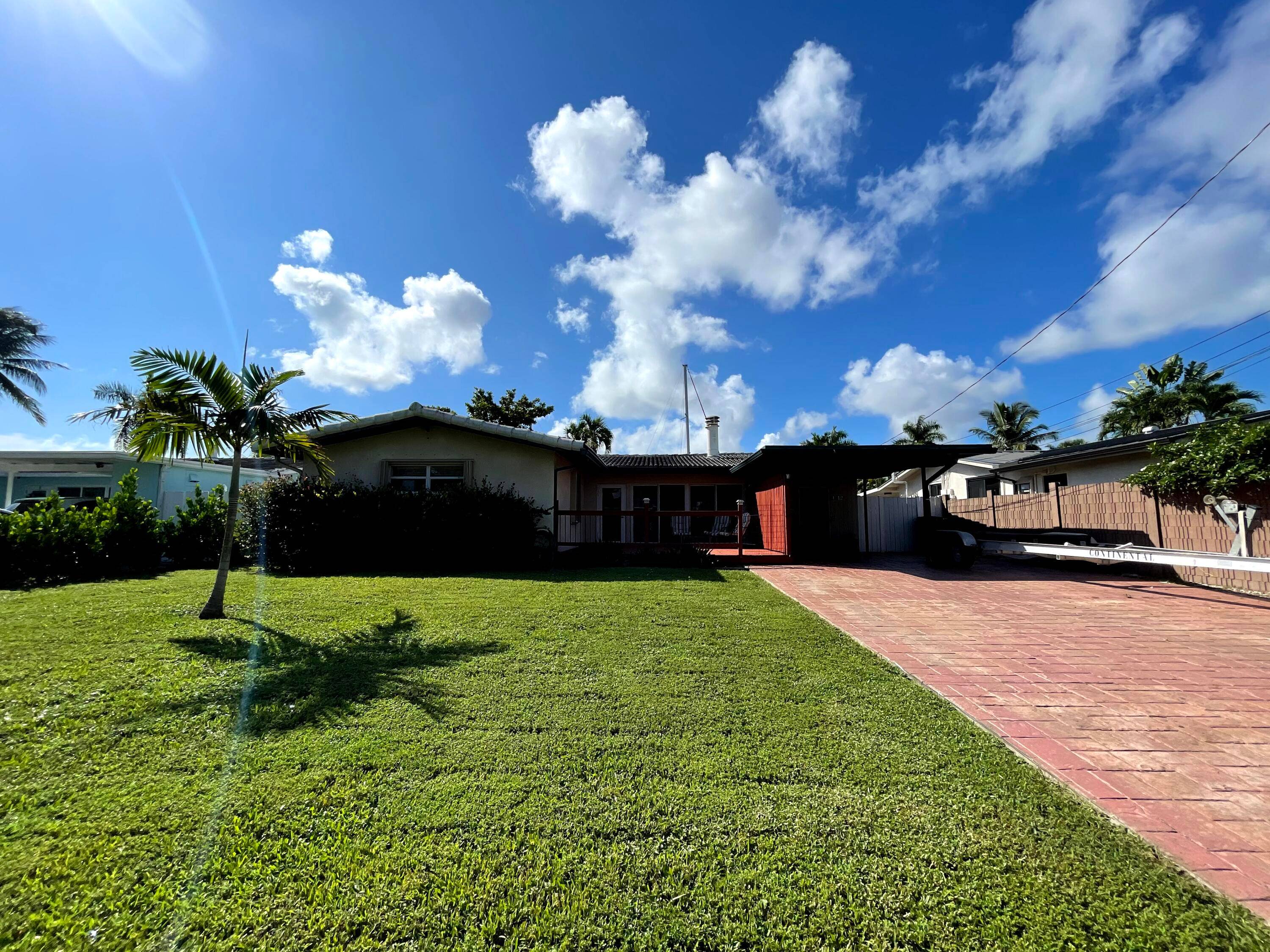 Don't miss this 3 bedroom, 2 bath updated home that features a private dock for your boat with direct ocean access !