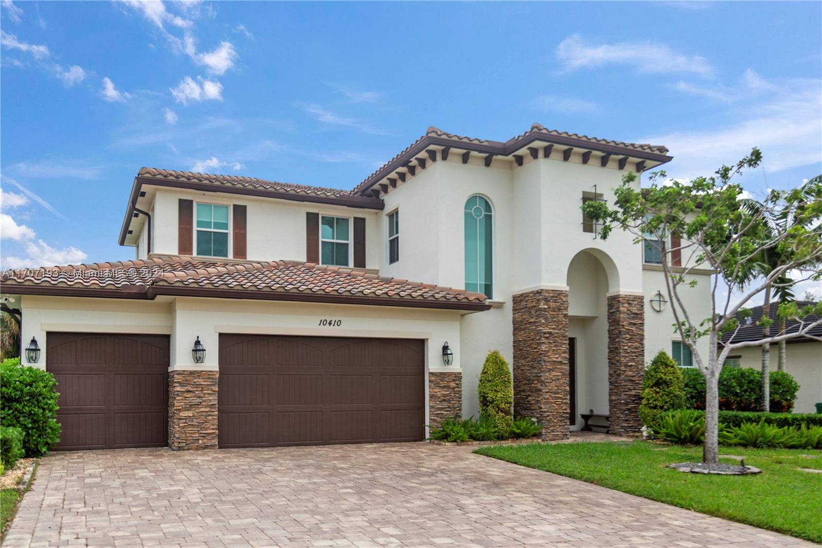 PRICE IMPROVEMENT ! Stunning home is located in the exclusive Ranchette Isle community in Cooper City.