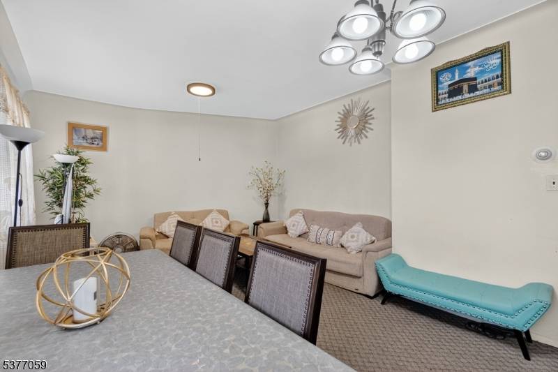 Welcome to this spacious two family home in the heart of Bayonne, offering a fantastic opportunity for both Owner occupants and investors.