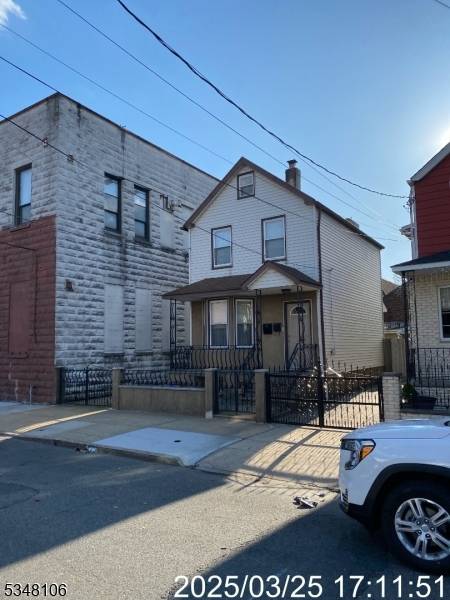 Welcome to this well maintained legal 2 family home offering exceptional versatility and value !