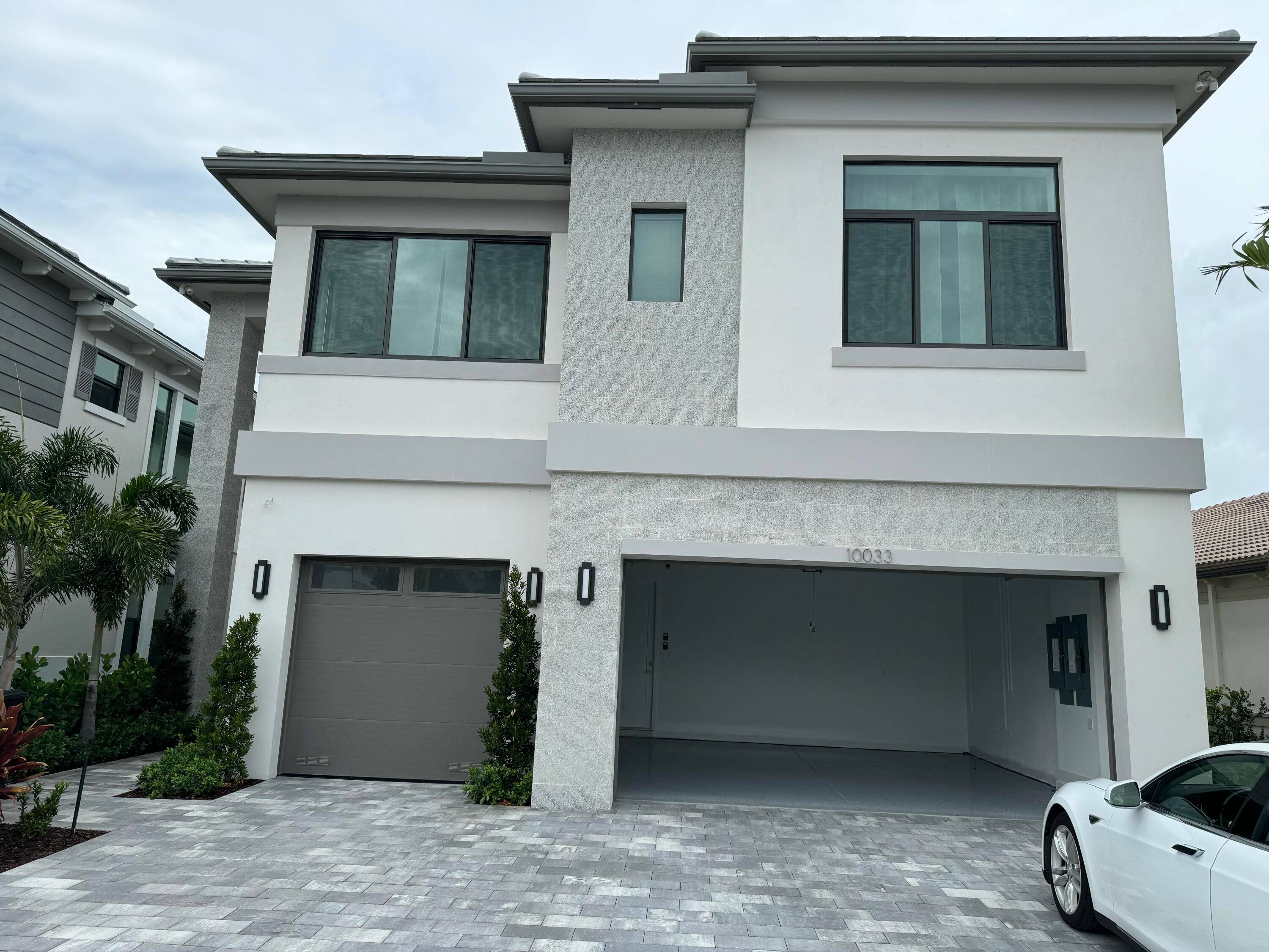 Step into this stunning brand new 5 BR, 5 Bath home in the heart of the beautiful neighborhood Palm Beach Gardens, complete with a spacious 3 car garage.