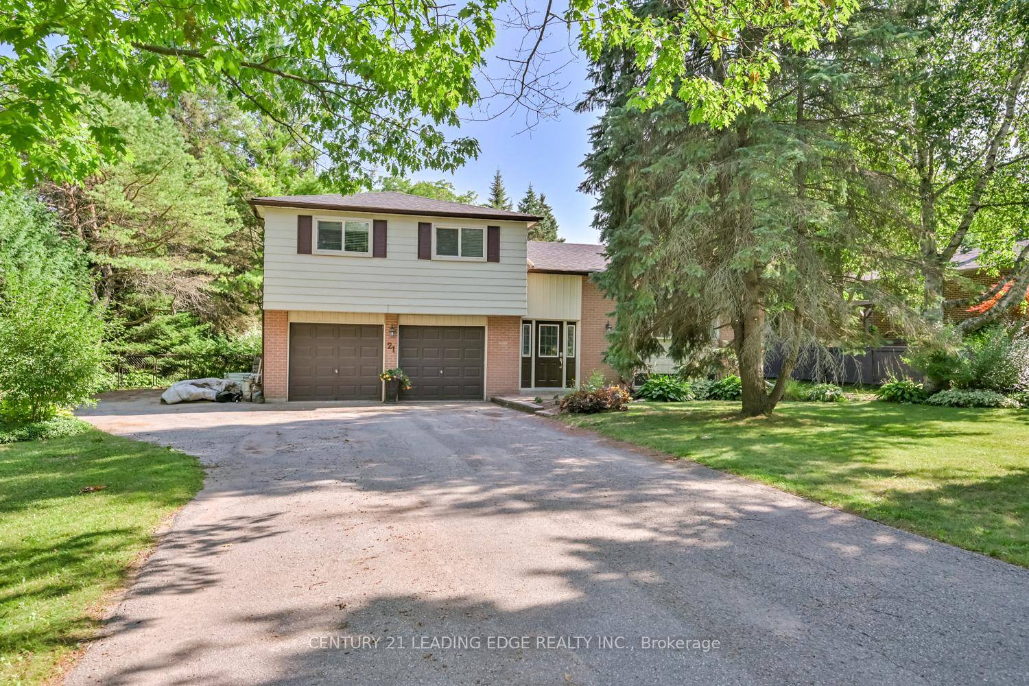 Welcome to this charming and versatile home situated on an expansive and beautifully landscaped 0.