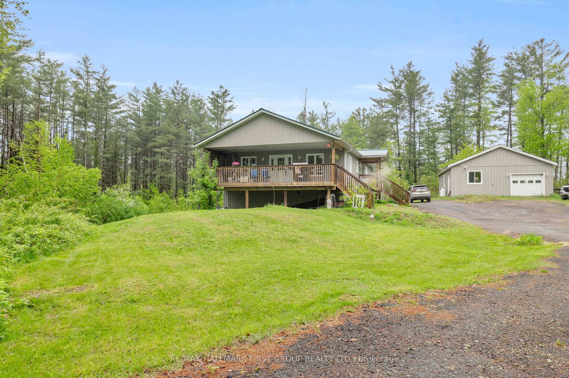 10 ACRE WOODED COUNTRY SETTING !