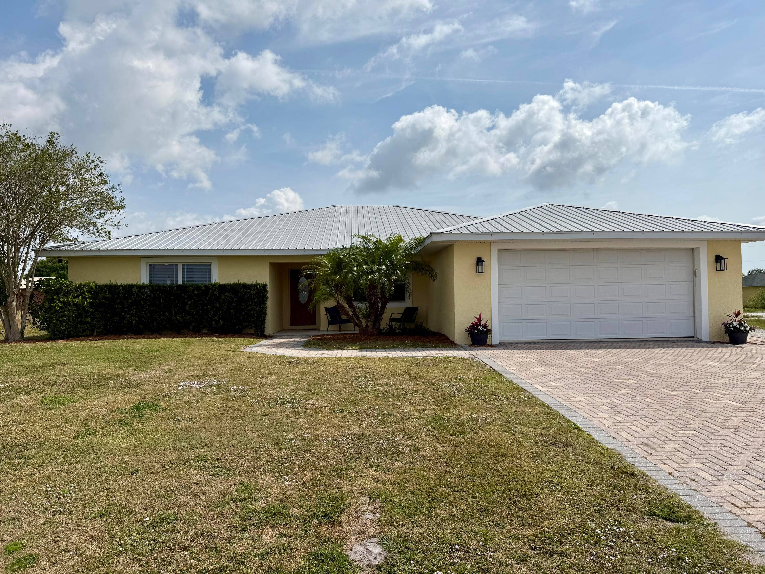 Welcome to this beautiful custom built home in the desirable Edgewater Acres !