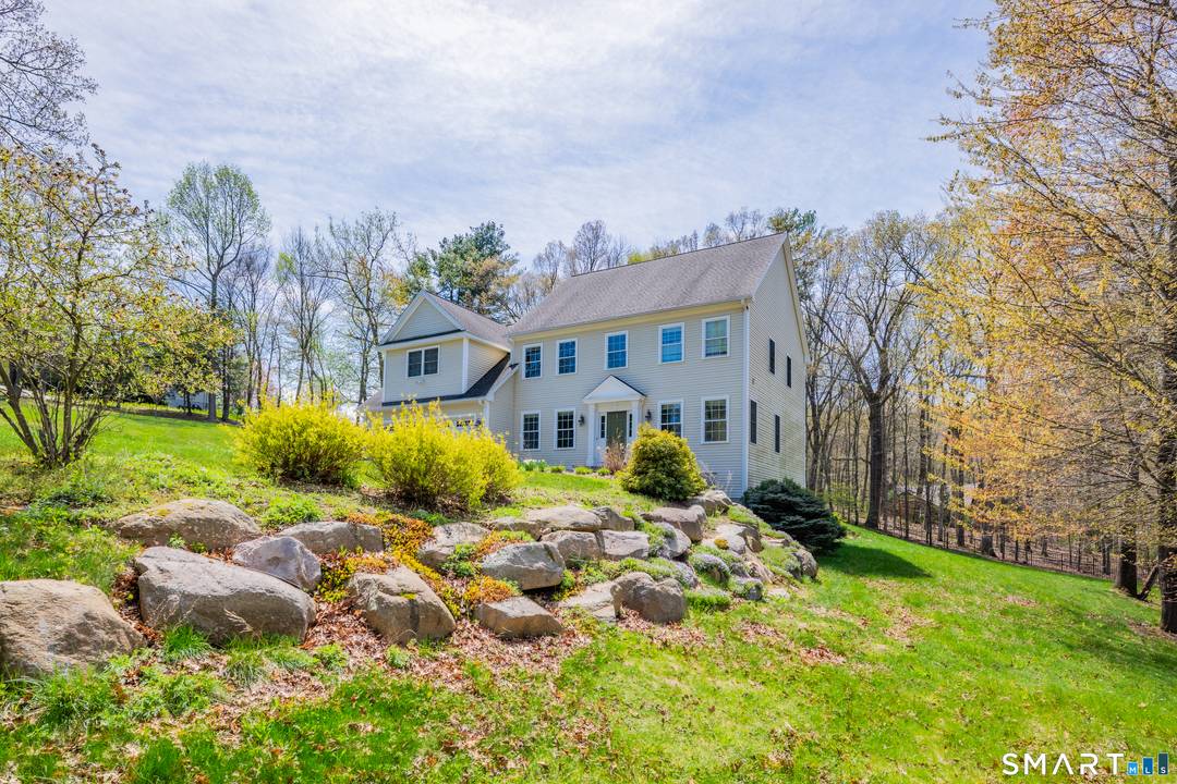 Welcome to this custom built Colonial, thoughtfully designed and ready for its next owners.