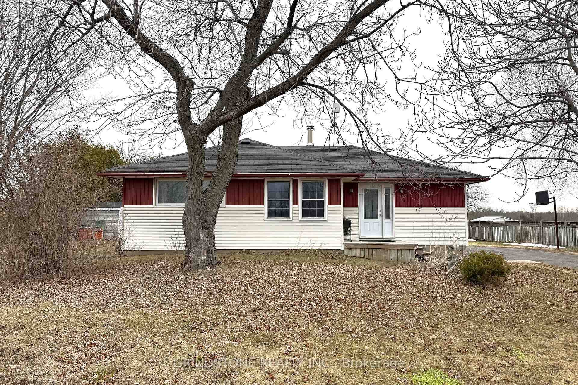 This charming bungalow on Highway 15 offers the perfect blend of comfort and opportunity.
