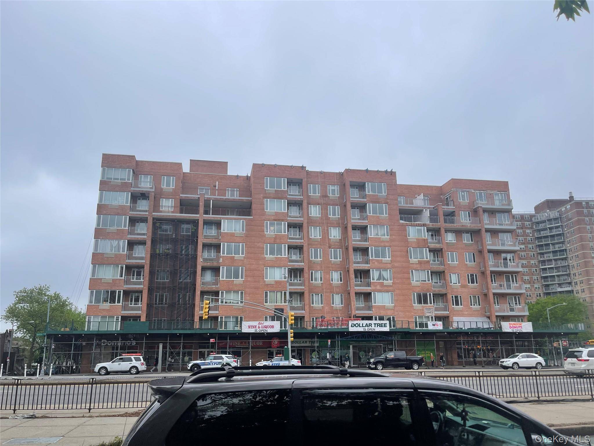 Well maintained building is located in the heart of Woodside.