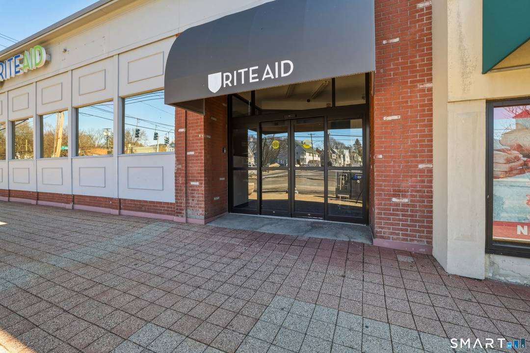 An exceptional opportunity to acquire or lease a highly visible commercial building located at 3680 Main Street in Stratford, Connecticut, formerly occupied by a Rite Aid pharmacy.