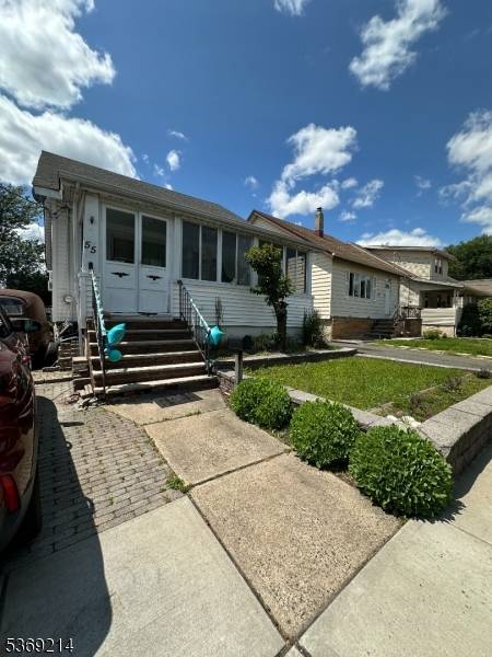 Bring your vision to 55 Center Street a charming home with major potential on a quiet, treelined street.