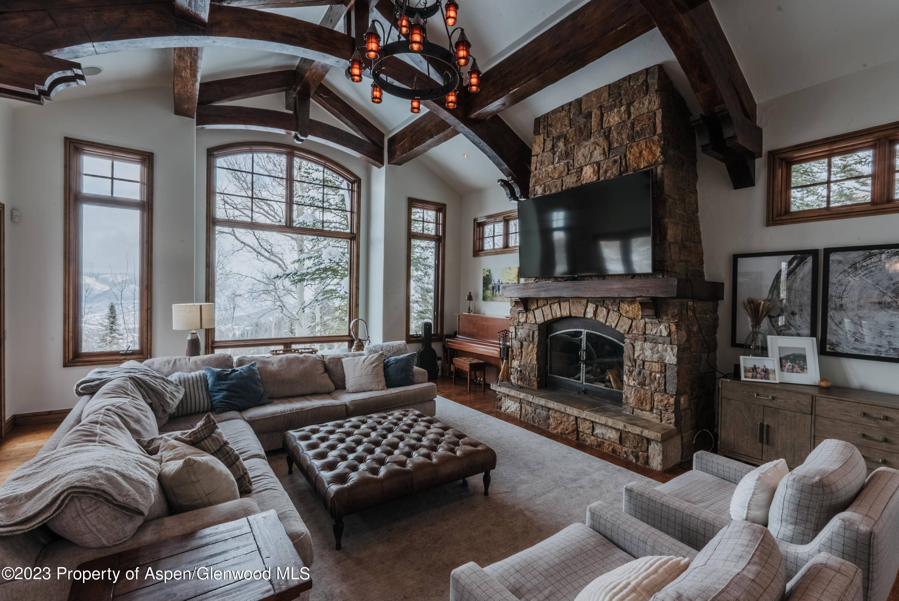 You'll feel as if you are on top of the world in this special home located in the Divide overlooking beautiful Snowmass Village.