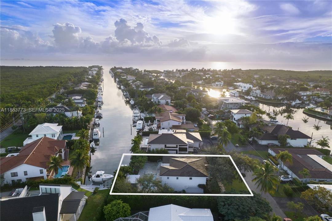 A beautifully appointed waterfront home in the gated community of Gables by the Sea, this 4 bed, 4.