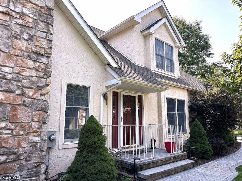 Situated on a cul de sac, this pristine, updated end unit town home with its 1st floor primary bedroom, secluded backyard and 2 car garage is sure to please.