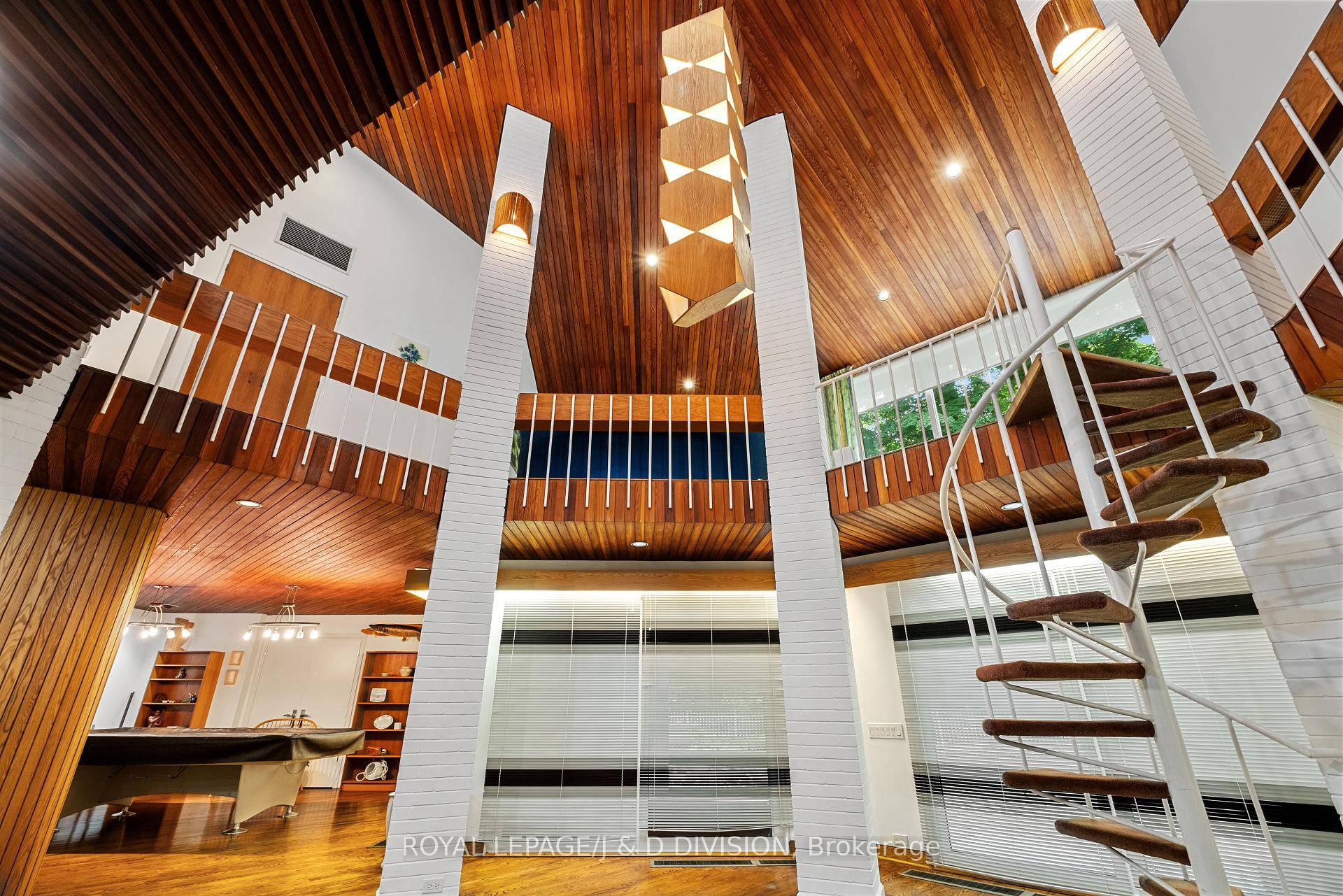 Nestled on a private Court in prime Markland Wood, this architecturally significant residence, designed by renowned Architect George Buchan, is a testament to modernism, drawing on inspiration from Frank Lloyd ...
