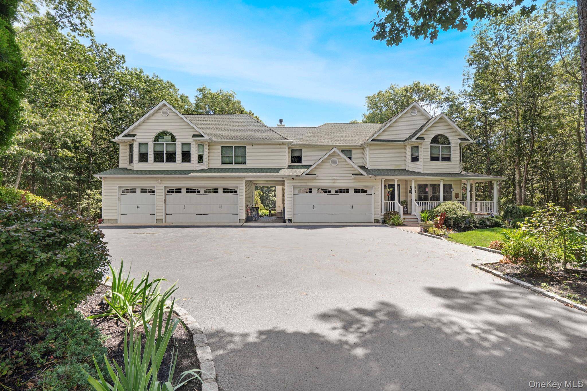 Diamond Dream Home in Manorville In ground, heated, saltwater pool, 5 car garage, bonus room and basement !
