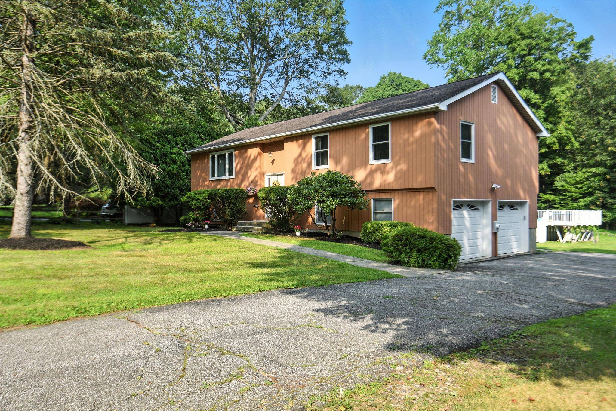 Welcome to 64 Dahlia Drive, a move in ready gem in the heart of Mahopac !