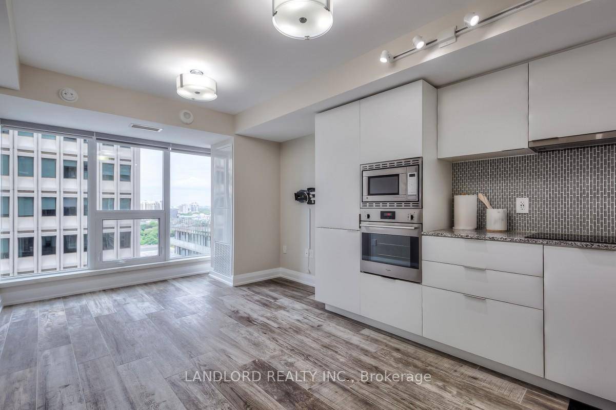 Experience Luxury Living In This Bright And Modern Suite Featuring An Open Concept Layout With Upgraded Finishes Throughout.