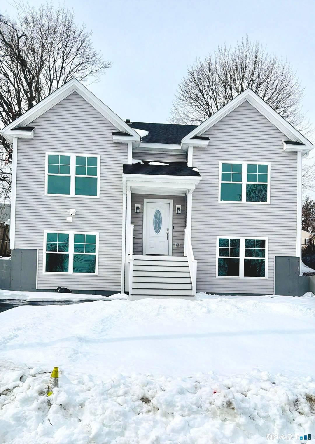 Welcome to this stunning newly built Raised Colonial offering modern living and a versatile bi level layout.