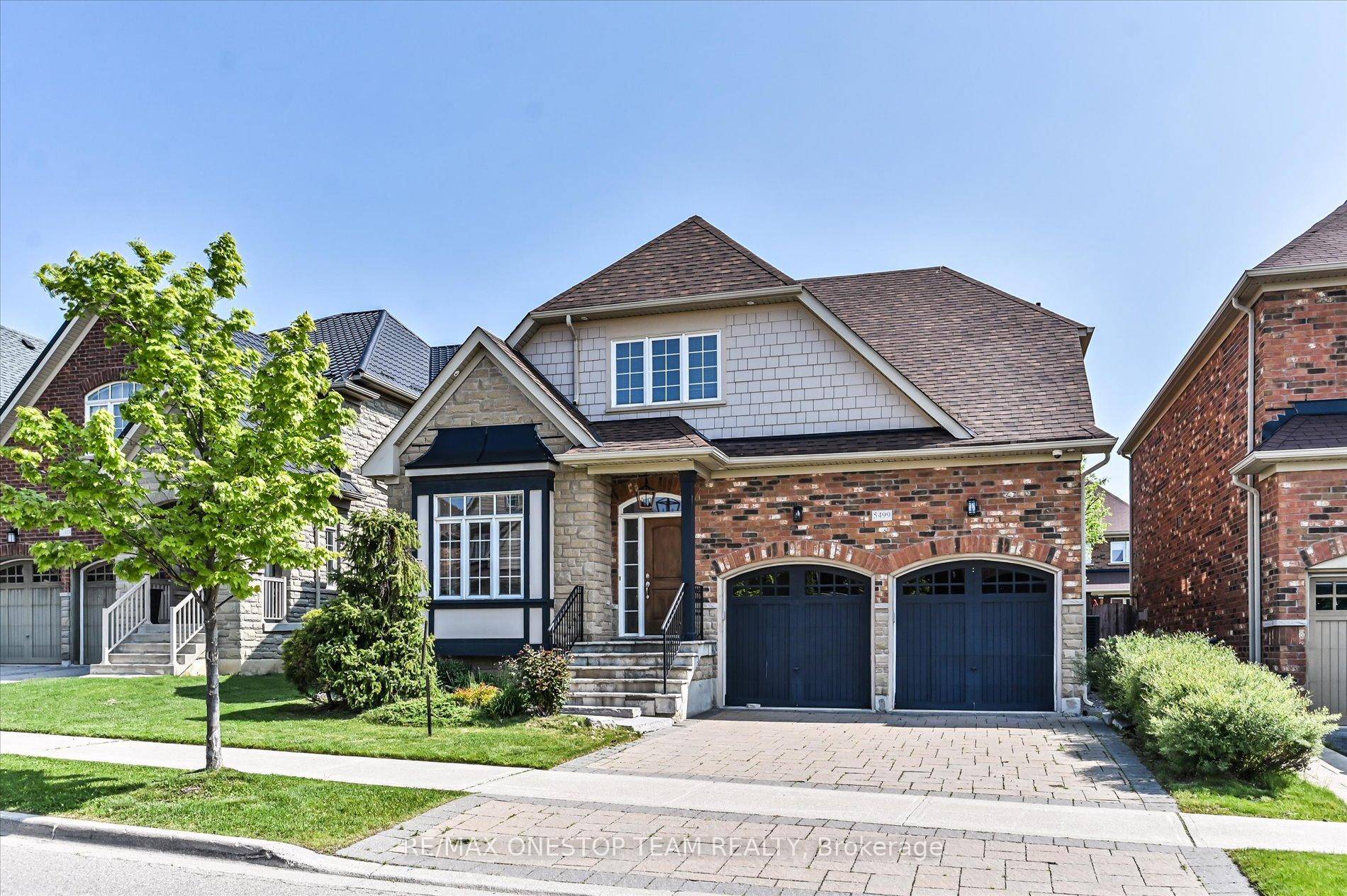 Discover this stunning and highly sought after bungaloft style detached home, offering 3 spacious bedrooms and the convenience of a main floor primary bedroom.