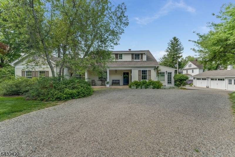 ABSOLUTELY CHARMING UNIQUE home with beautifully maintained gardens that will captivate you from the moment you pull into the driveway.