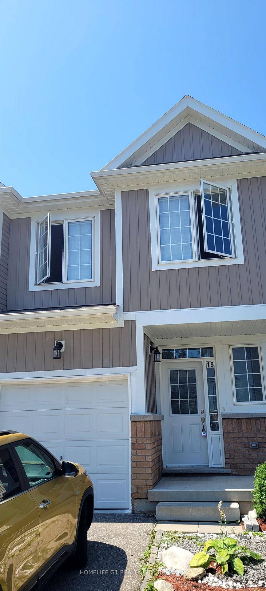 This charming and impeccably maintained end unit townhome is nestled in the tranquil west side of Brantford.