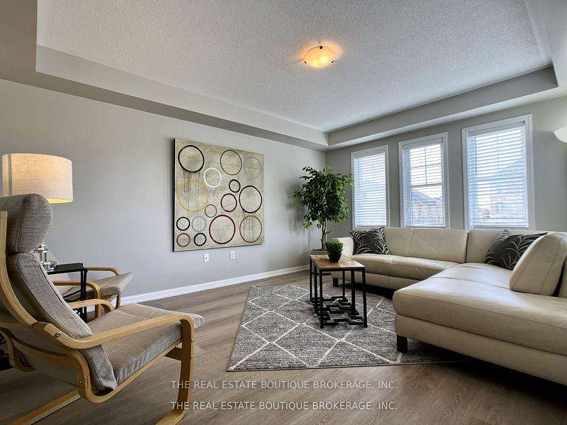 Stunningly updated with elegance, the theme with Crystal light fixtures, and solid oak staircases, complimented by new wood Vinyl plank flooring and styled with a rich neutral colour theme.