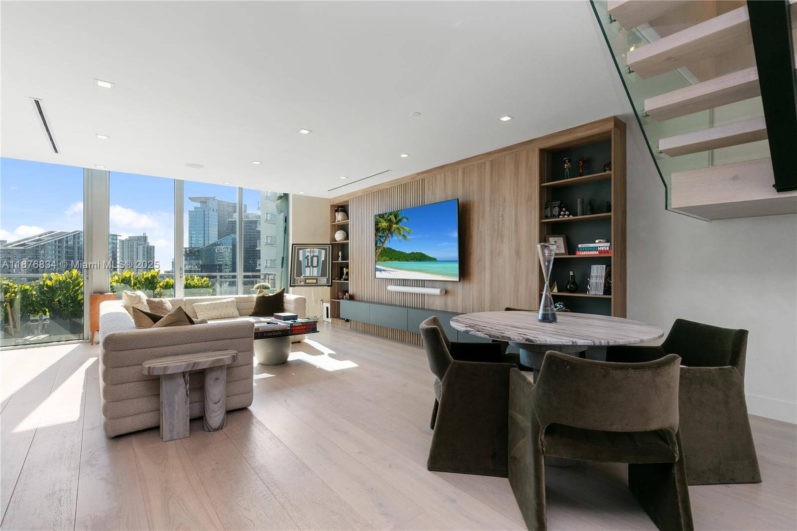 Welcome to Penthouse 14 at The Ivy, a renovated masterpiece overlooking Miami.