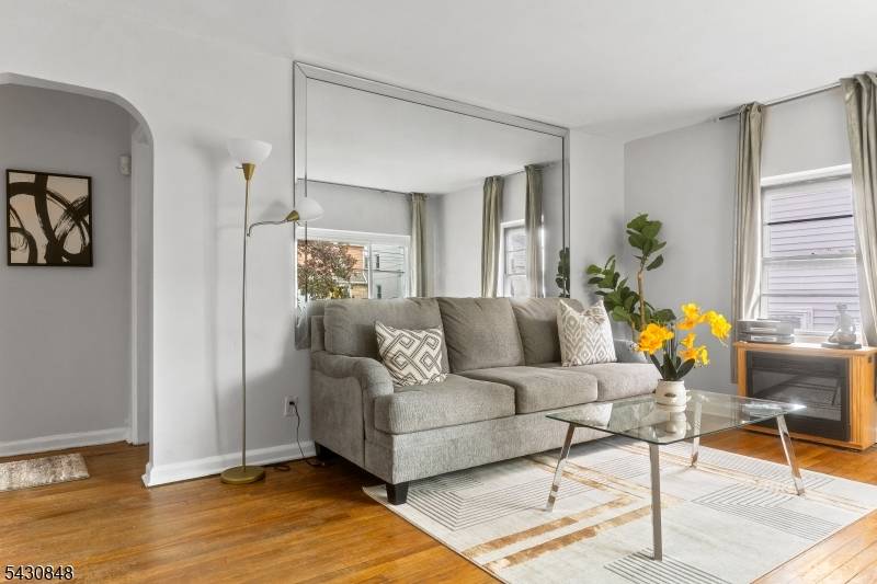 Welcome to this charming and spacious 4 bedroom, 2 bath Cape Cod perfectly situated on a corner lot tree lined neighborhood !