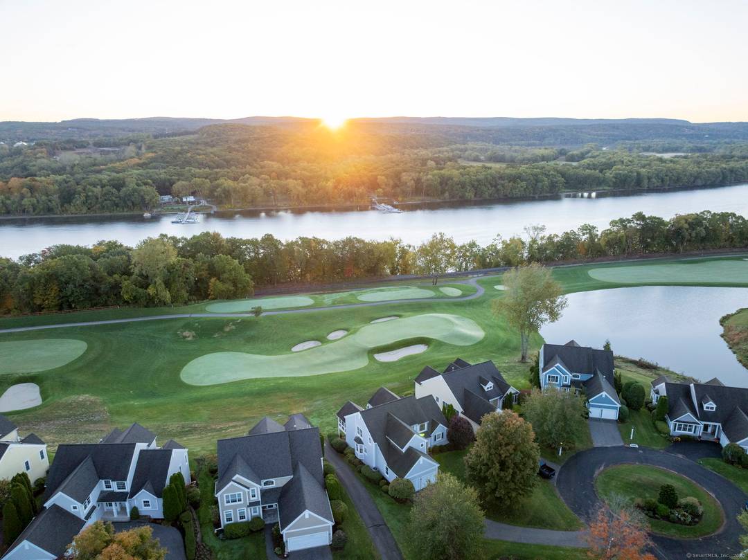 Can you imagine waking up each morning to the pristine view of the 12th green at TPC River Highlands from your sunroom or your deck ?