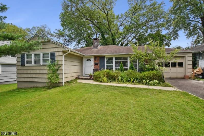 One level Ranch in ideal Short Hills location on totally level lot on a quiet street walking distance to the Short Hills Train Station 0.