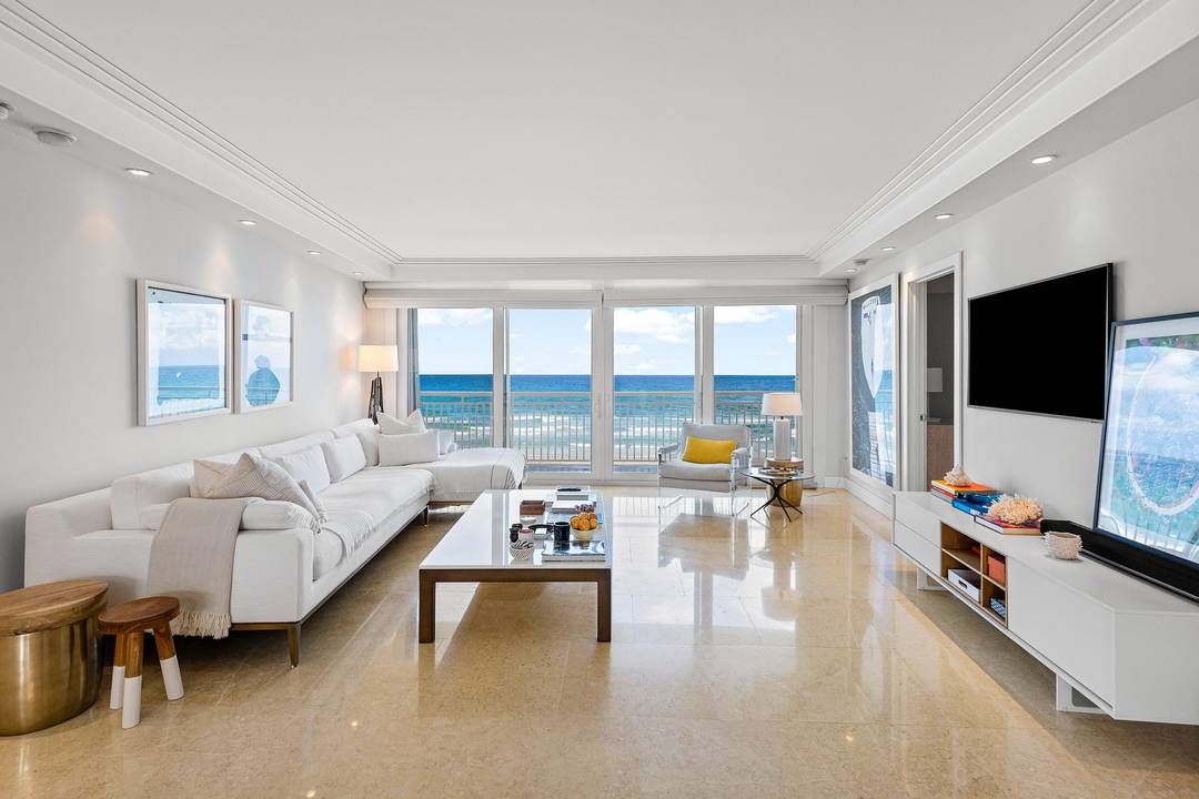 Spectacular direct ocean views from every room in this fully renovated, high end modern corner apartment, beautifully furnished with exceptional taste.