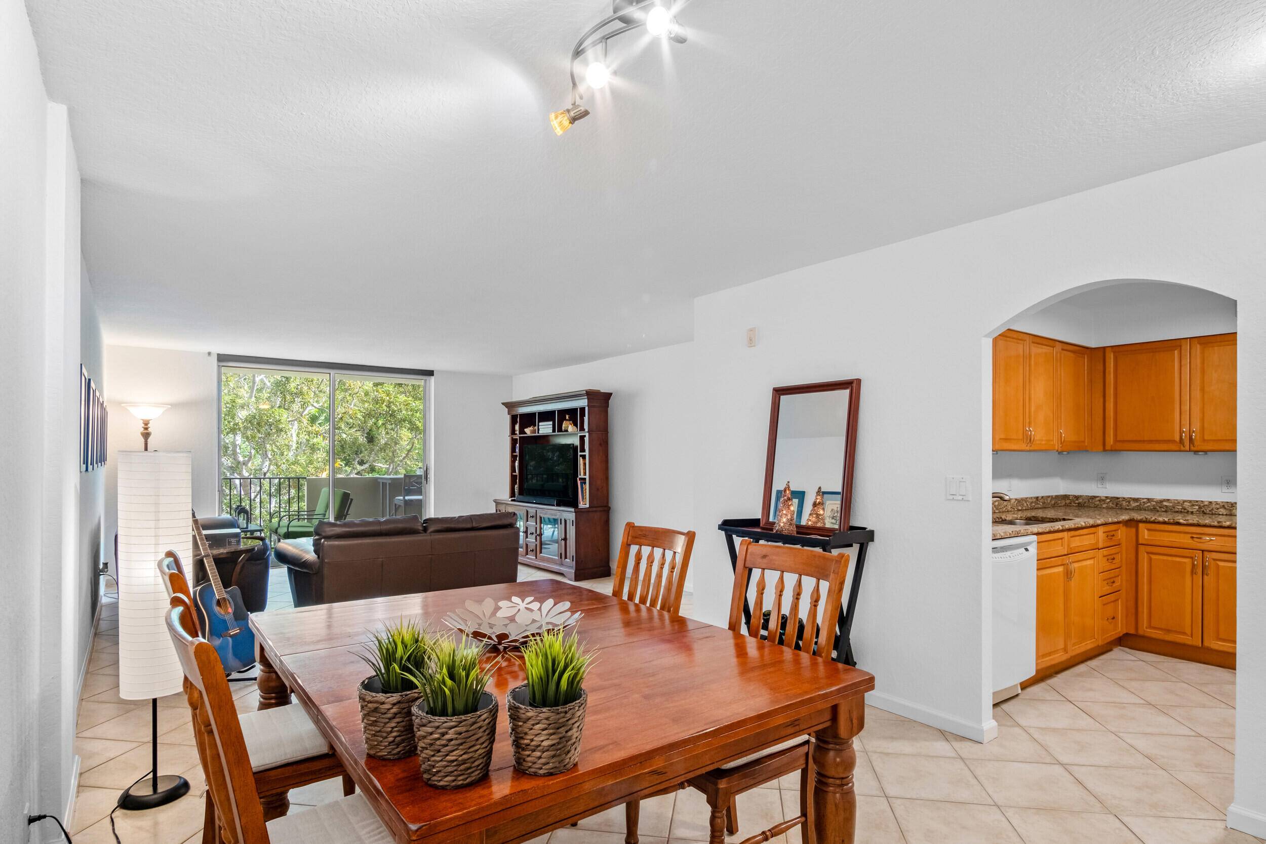 Enjoy this fully furnished 1Be 2Ba condo East of Fed and steps from the beach.