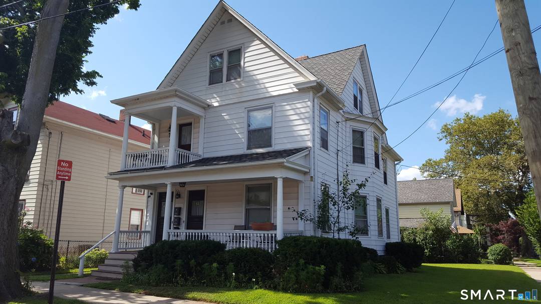 Immaculate, turnkey 3 family house in City Point neighborhood of New Haven has been beautifully maintained.