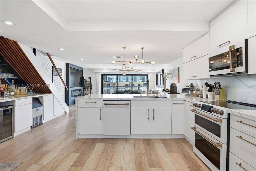 Experience the pinnacle of waterfront living in this stunning residence, nestled within the exclusive, guard gated community of Eastern Shores, where luxury meets tranquility.