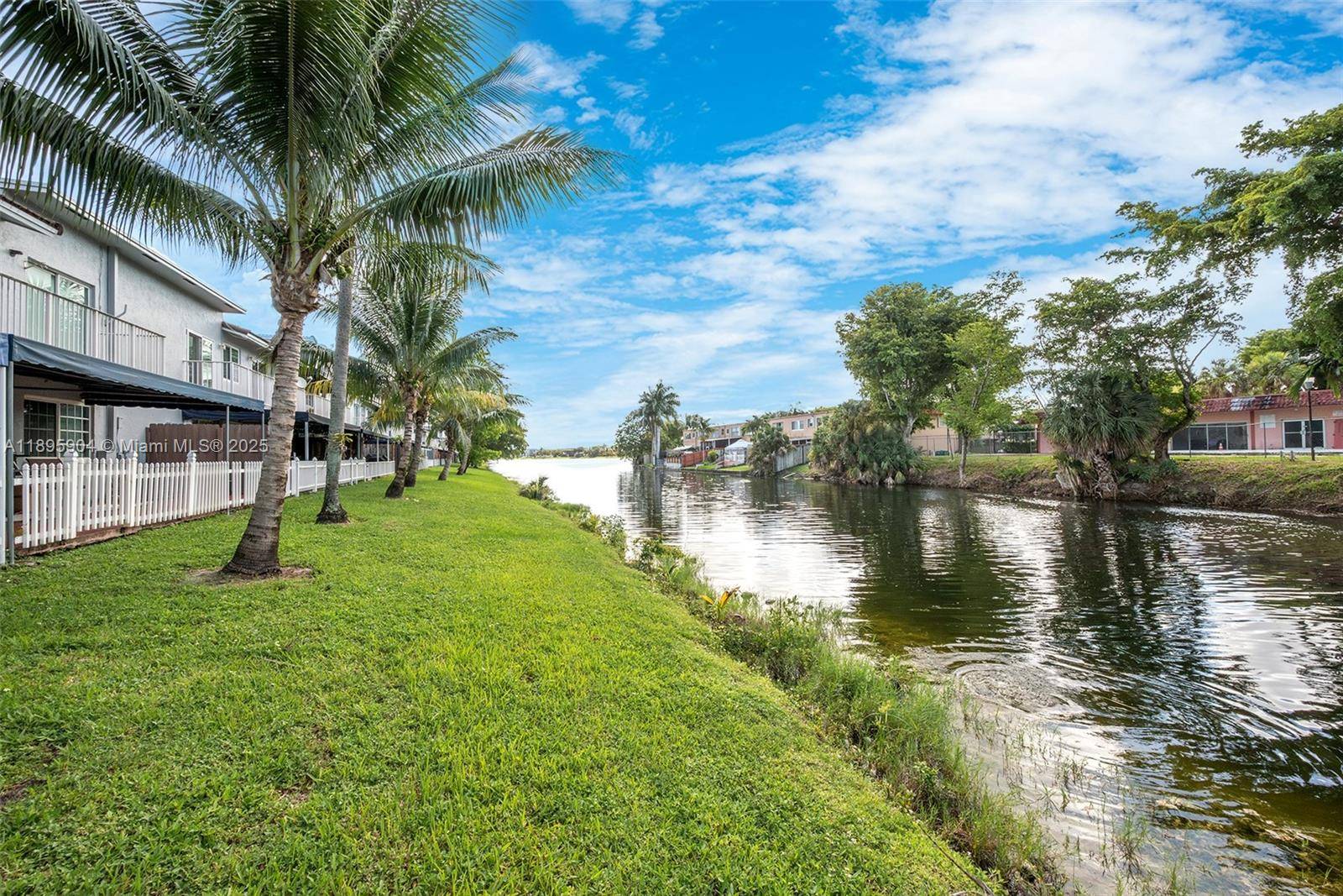 Beautifully remodeled 2nd floor waterfront condo in the sought after gated community of Lago del Rey !