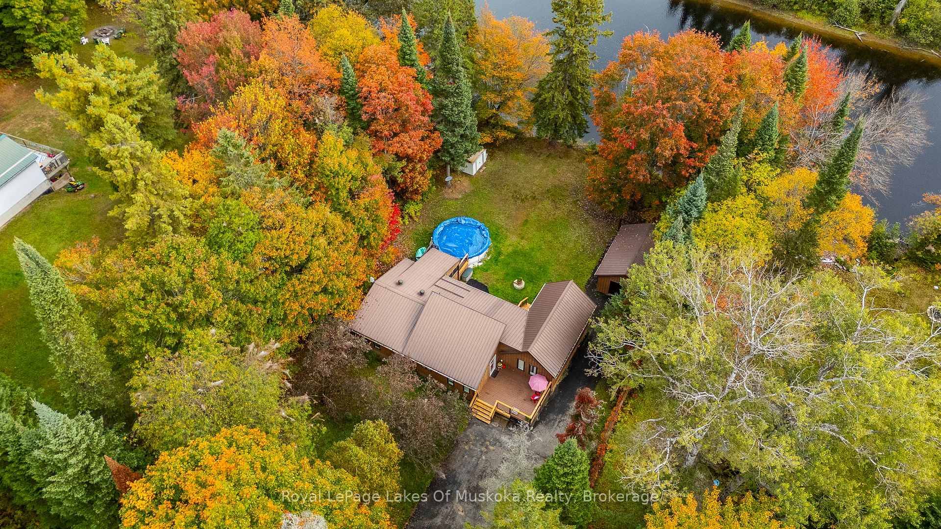 Set on a peaceful bend of the Muskoka River with 100 feet of water frontage, 29 Ascott Lane delivers easy, level riverfront living on almost 1 2 acre.