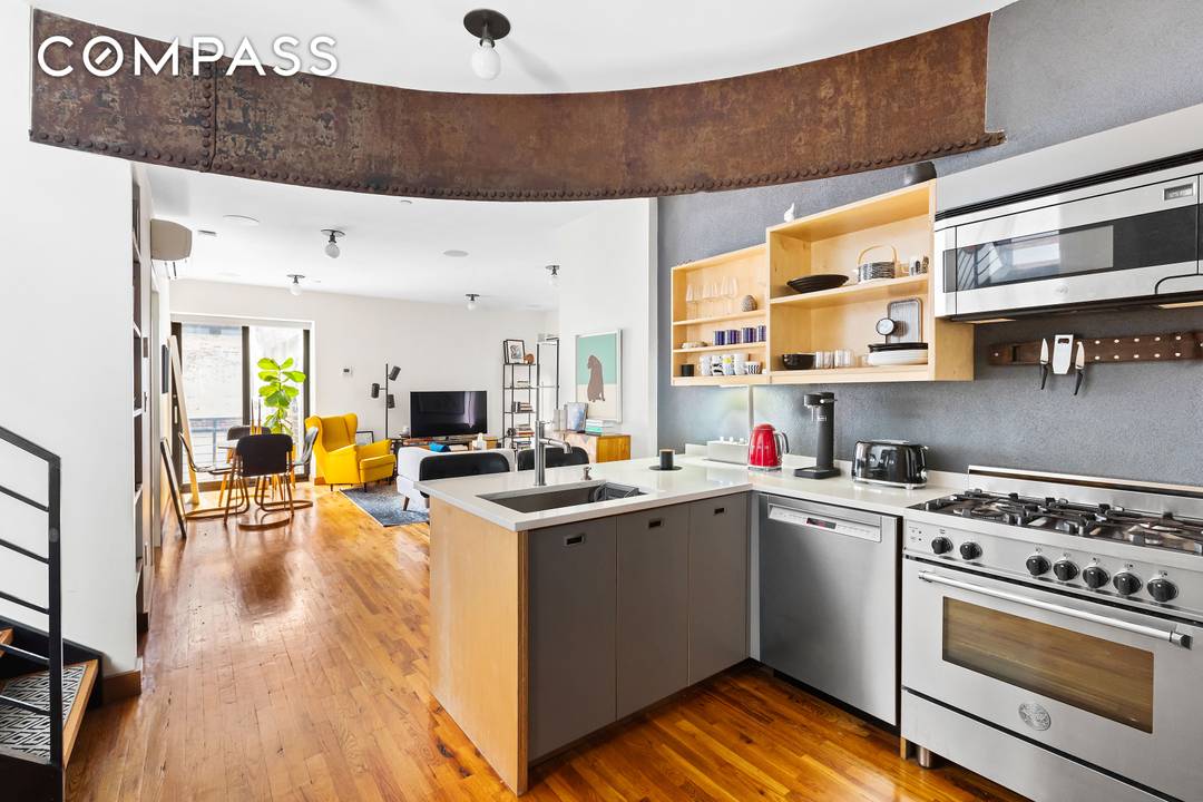 Rarely available 2BR 2BA southern facing Duplex with a Private Roof Deck and Private Balcony in DUMBO !