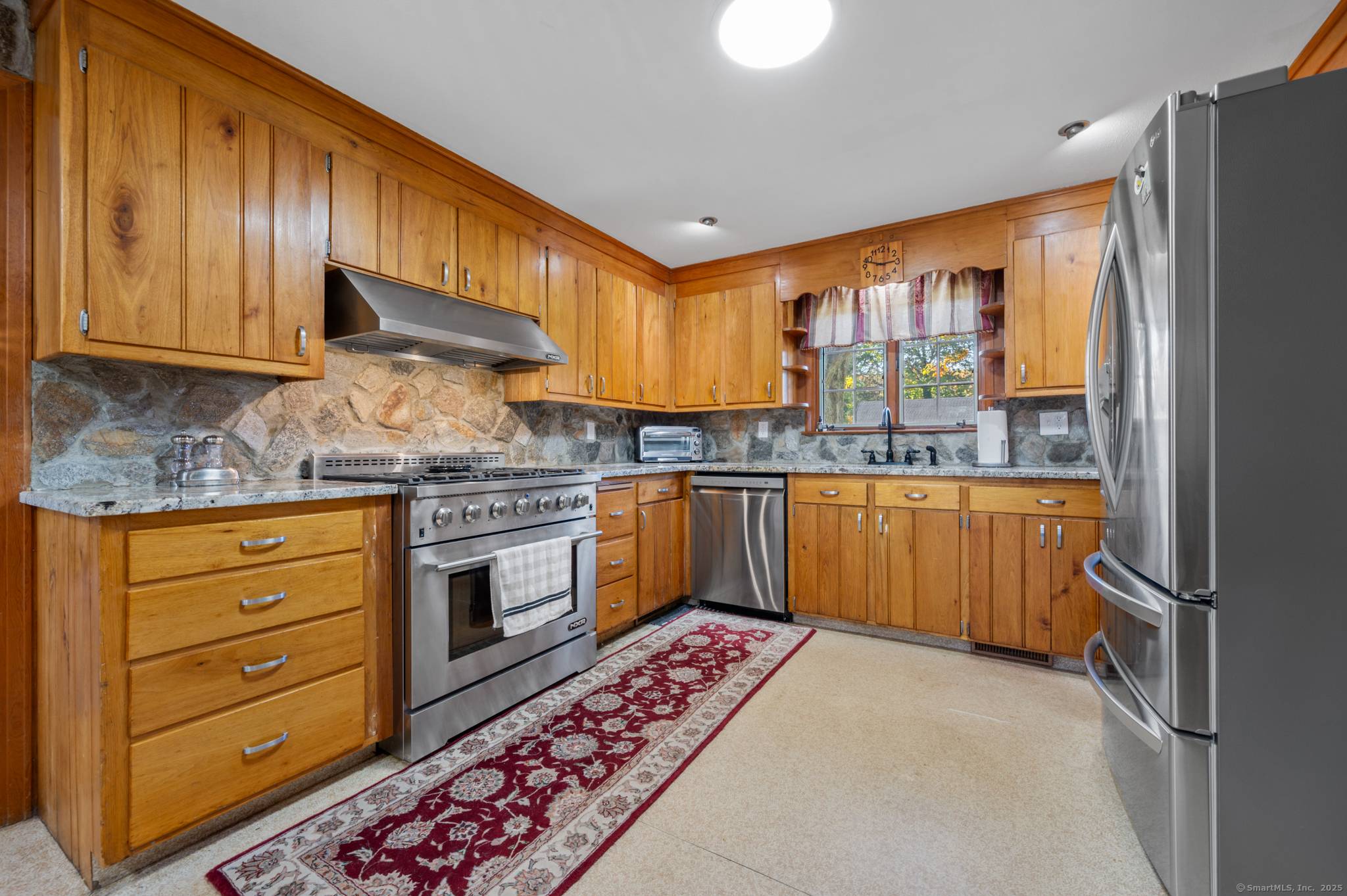 Beautifully set on private spacious lot overlooking babbling brook with views across the entire rear of this impress Sprawling Ranch Home from both levels, main and the walk out finished ...